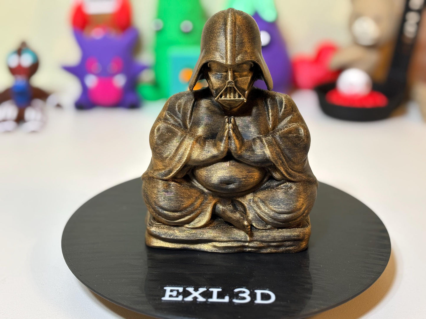Hand-painted 3D printed Buddha Darth Vader statue shown at five inch scale reference