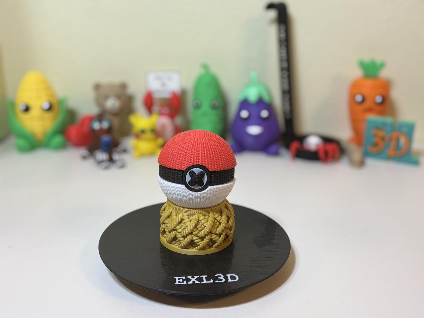 3D printed faux knit pocket ball in red white and black on desk