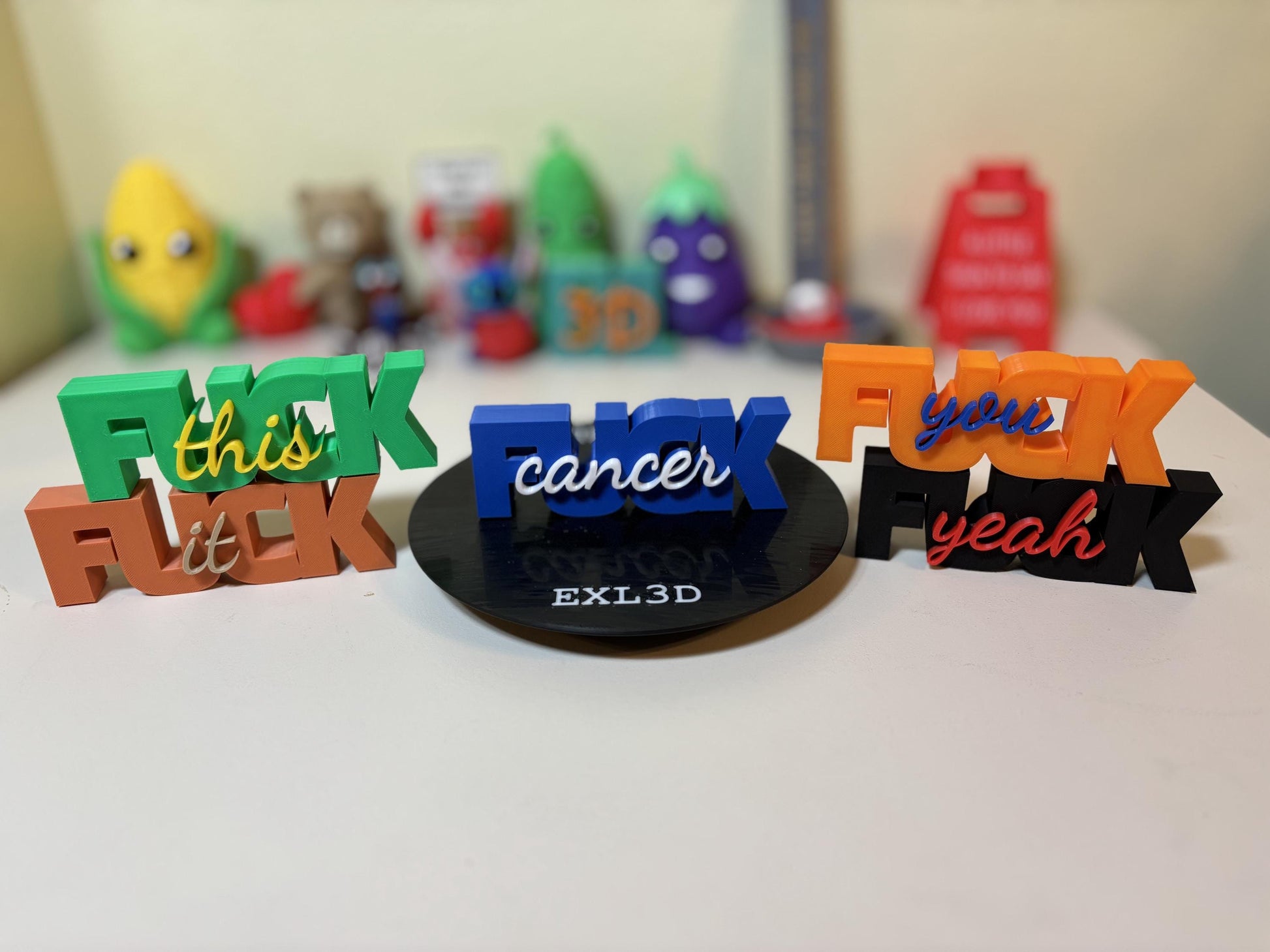 Custom 3D printed F-word desk sign in white with scripted word on top