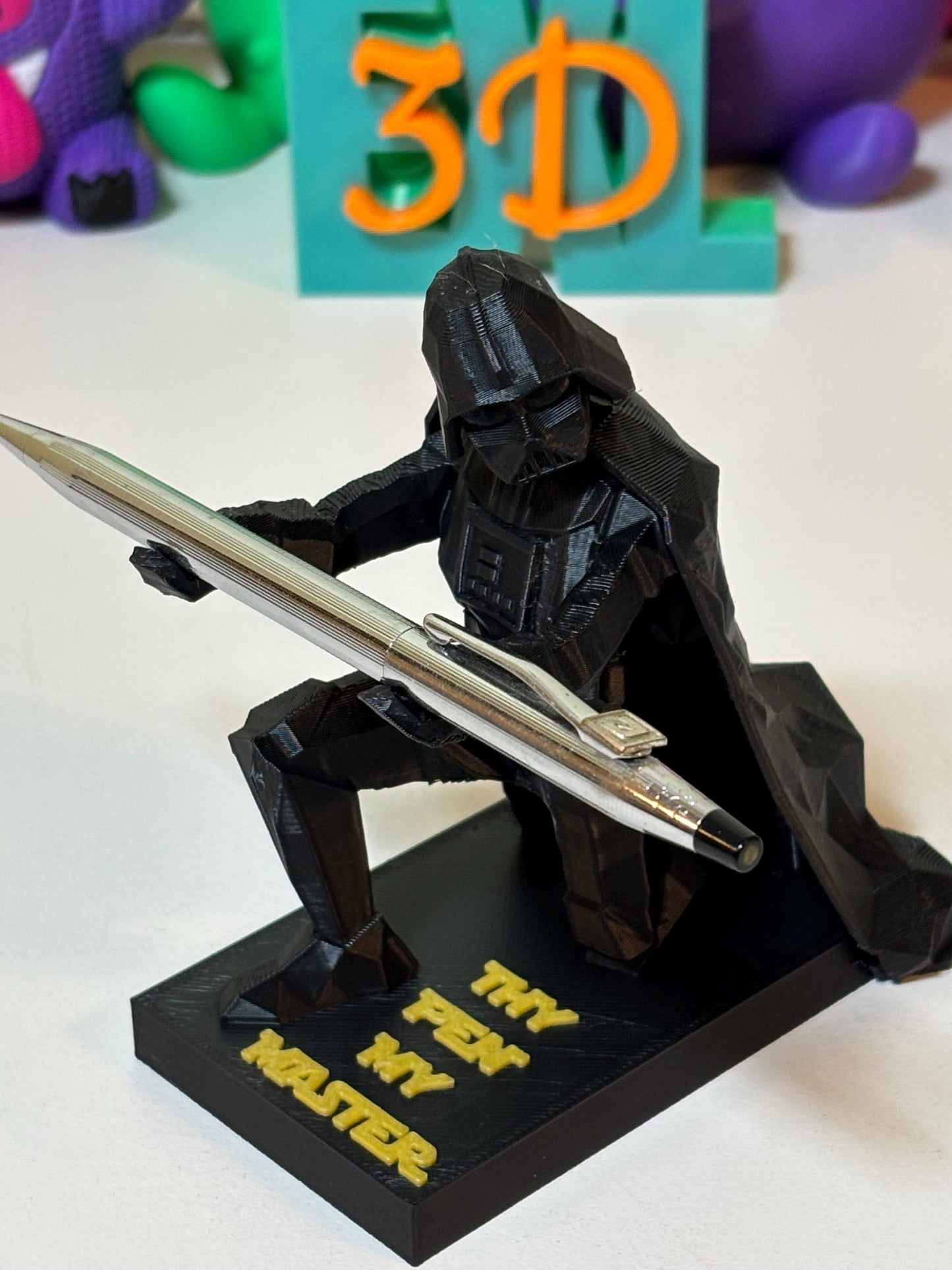 3D printed Vader figure with custom base text Thy Pen My Master in matte black