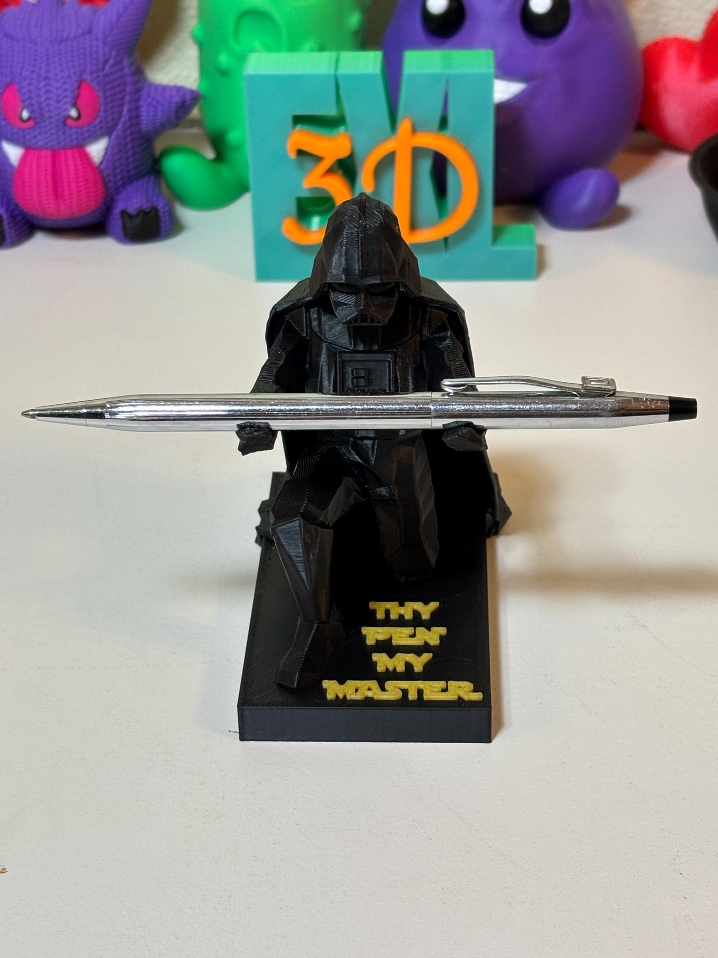 Low poly Darth Vader 3D print shown next to ruler to show 4.5 inch scale