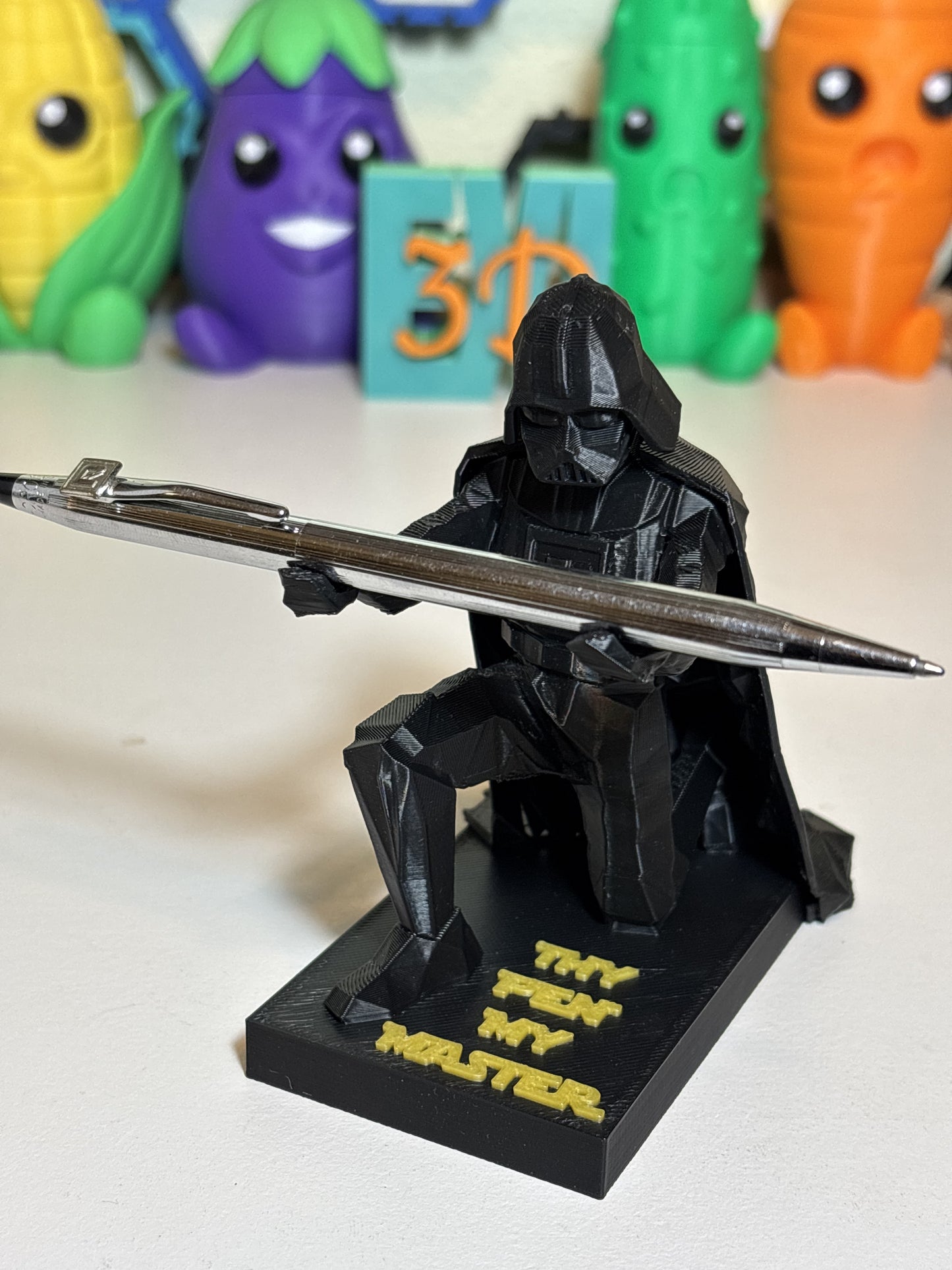 Low poly Vader ring holder styled as proposal gift with engagement ring displayed