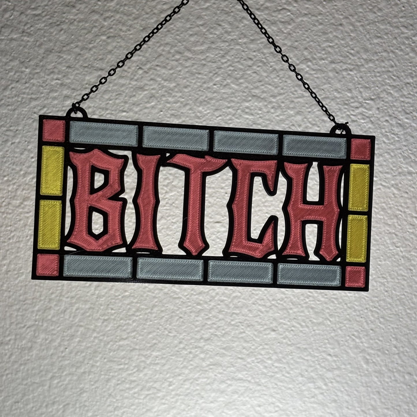 Spicy suncatcher product flat lay showing full 7 inch by 3 inch dimensions