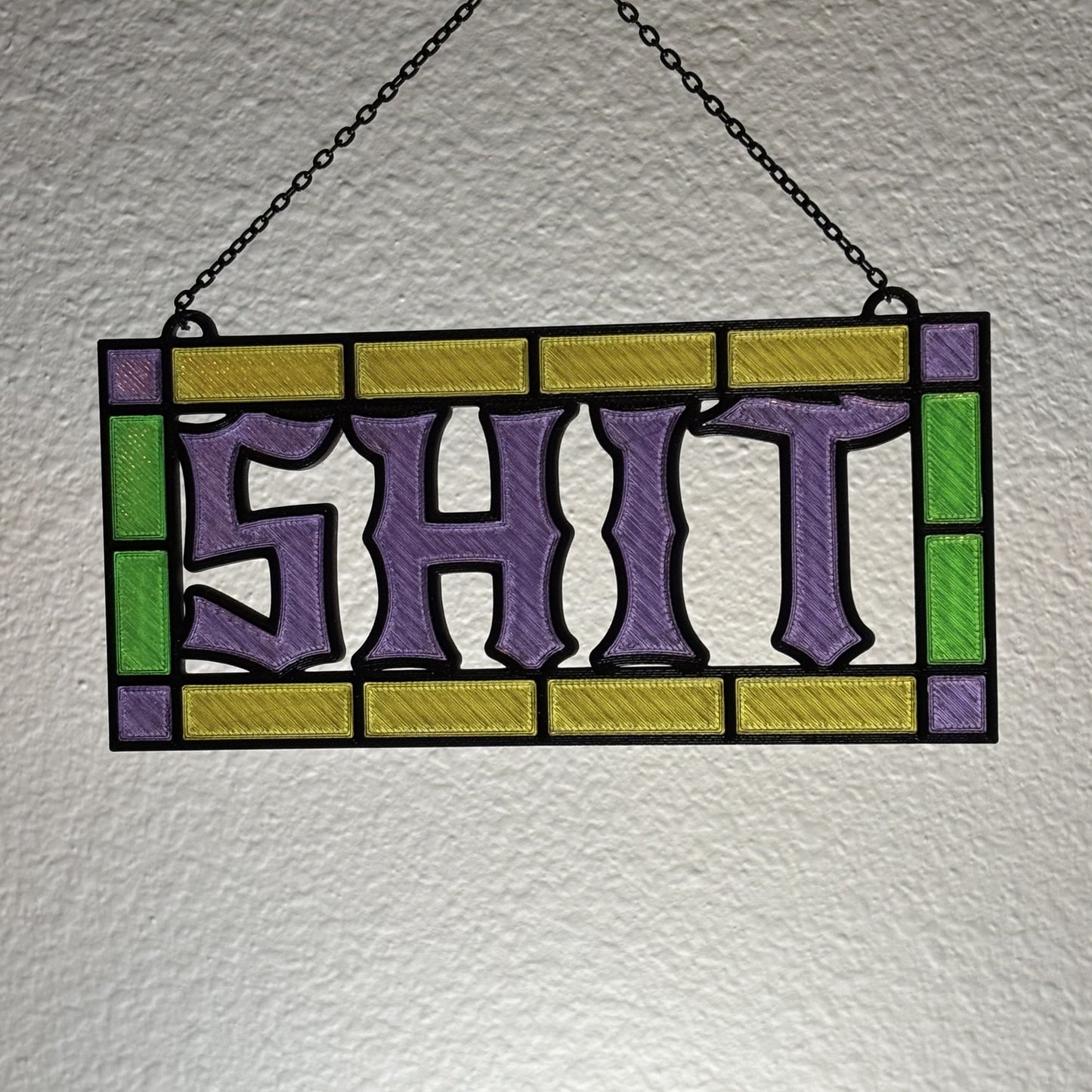 Side angle of 3D printed suncatcher showing lightweight translucent PLA depth