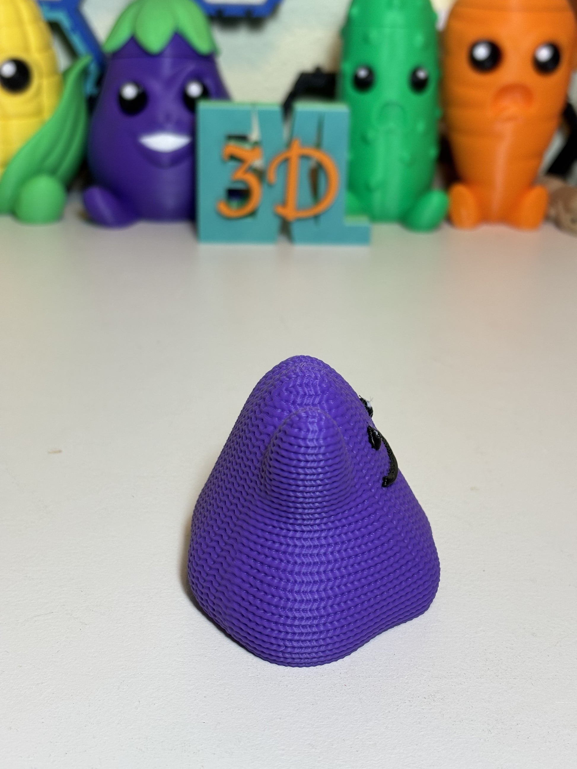 Close-up of 3D printed Ditto statue showing detailed faux knit surface finish