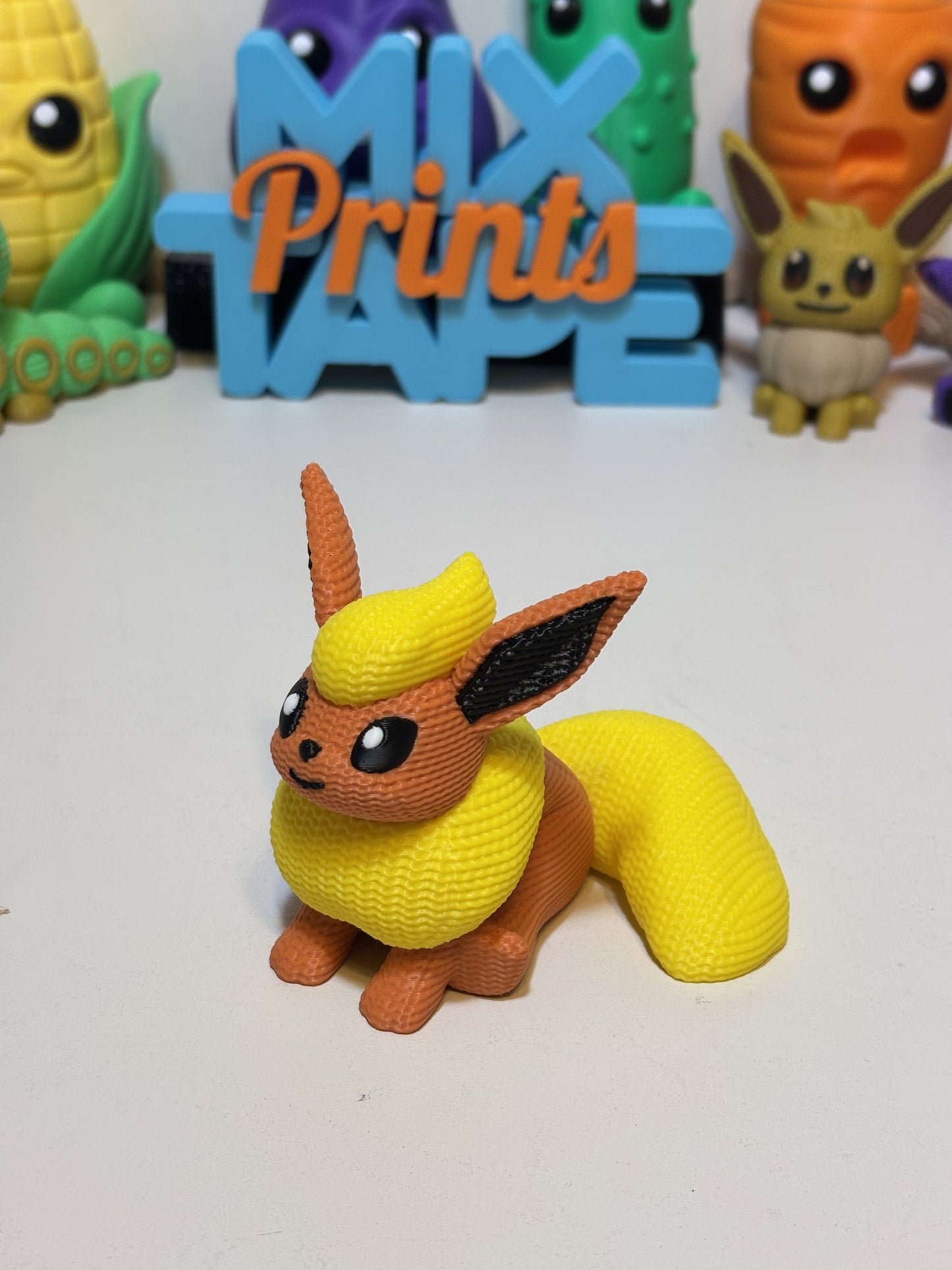 Close-up of faux knit texture detail on Flareon Pokémon statue