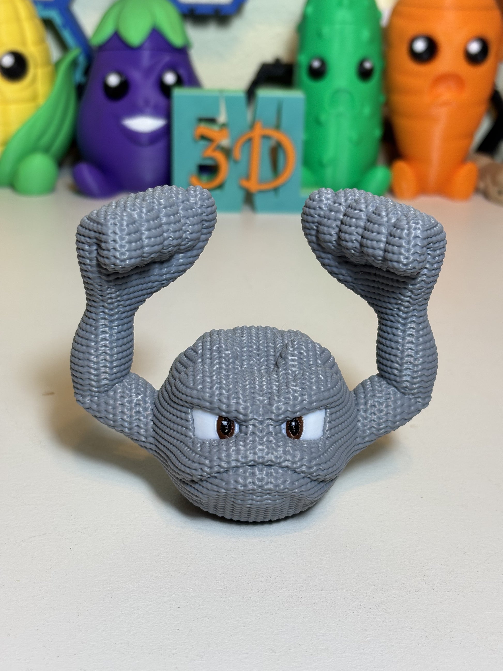 Close-up of Geodude 3D printed statue showing detailed knit texture pattern