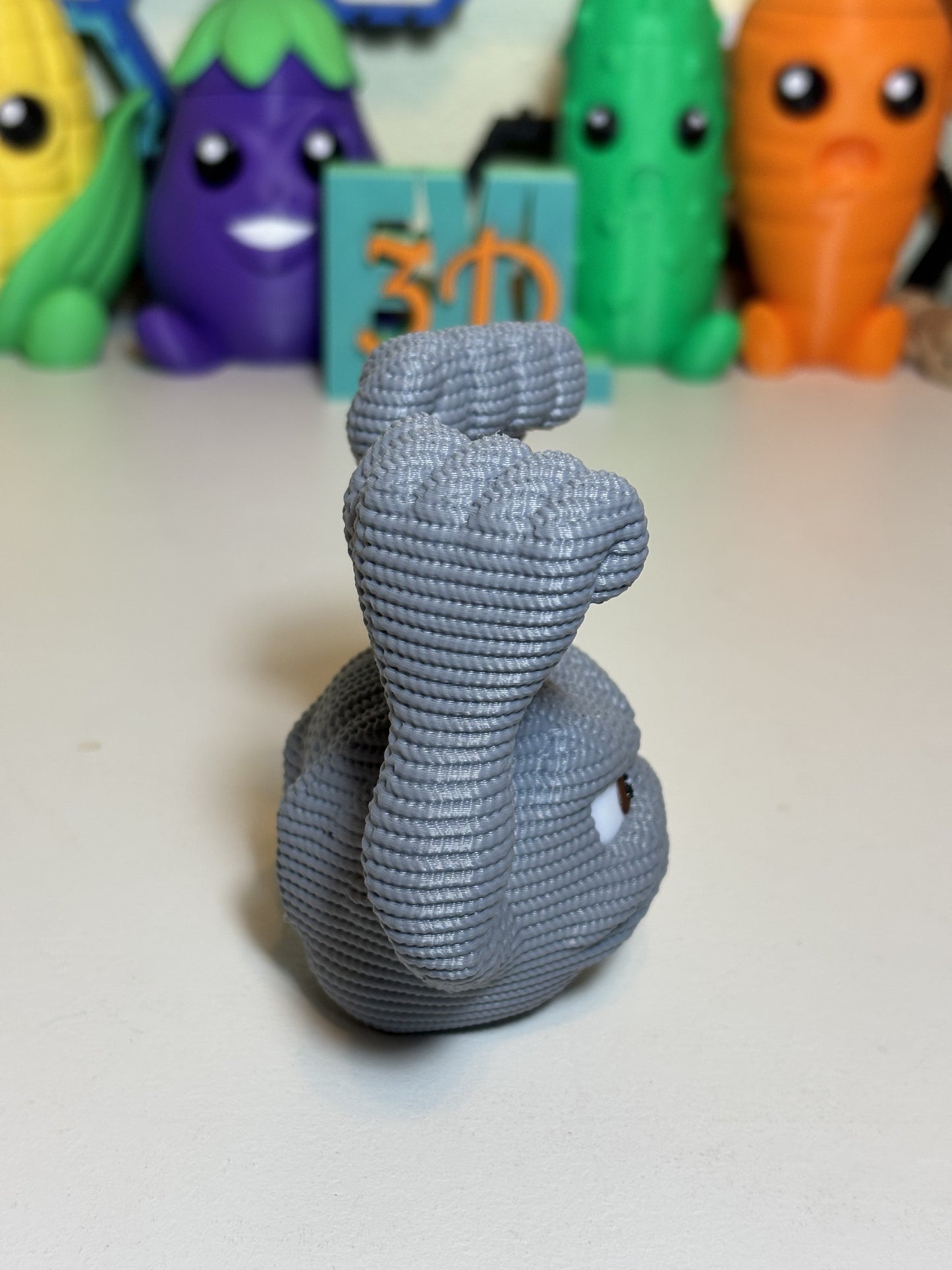 3D printed Geodude sculpture displayed on gamer desk shelf decor