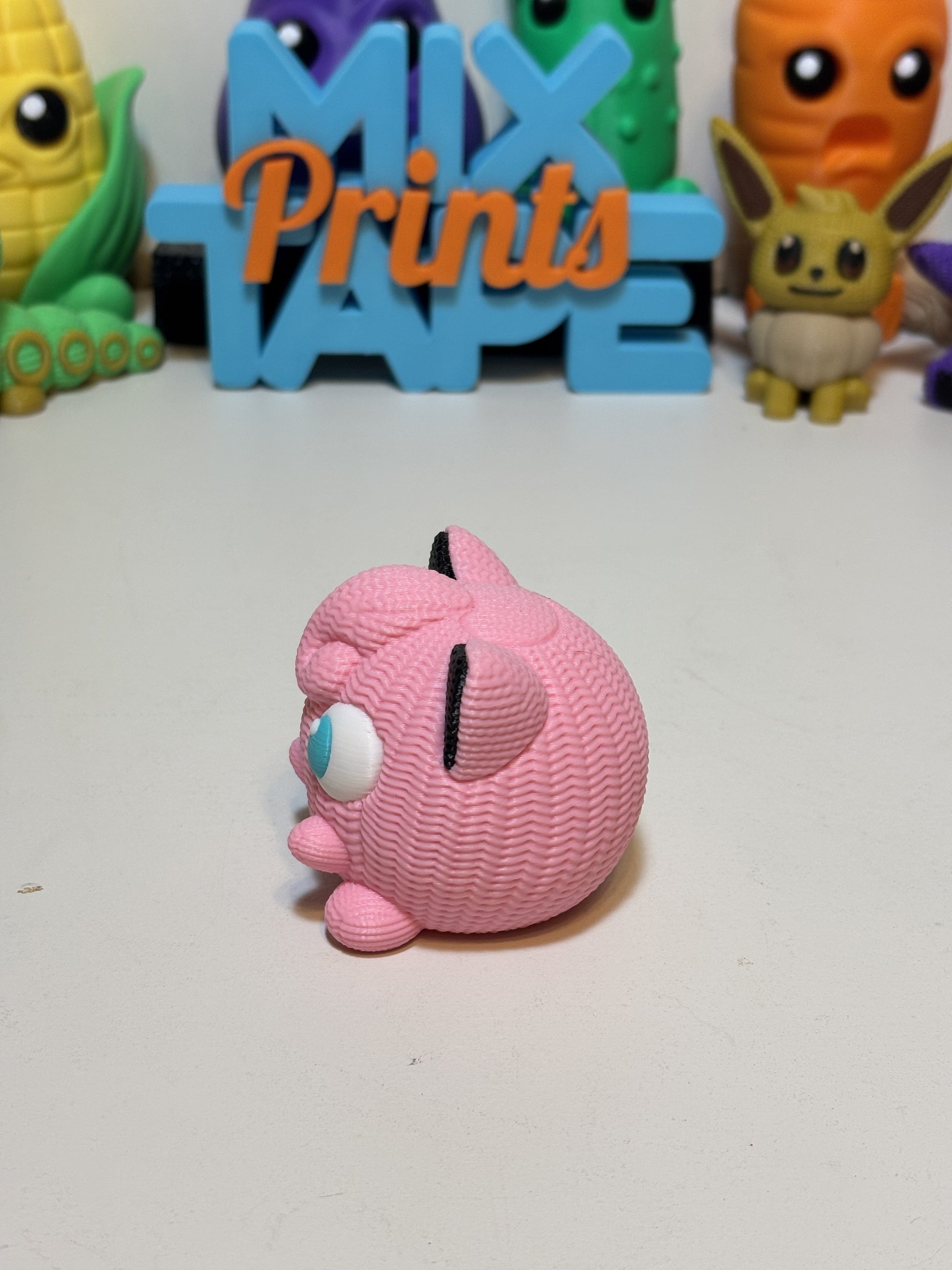 Jigglypuff 3D printed sculpture displayed on desk as gaming room decor