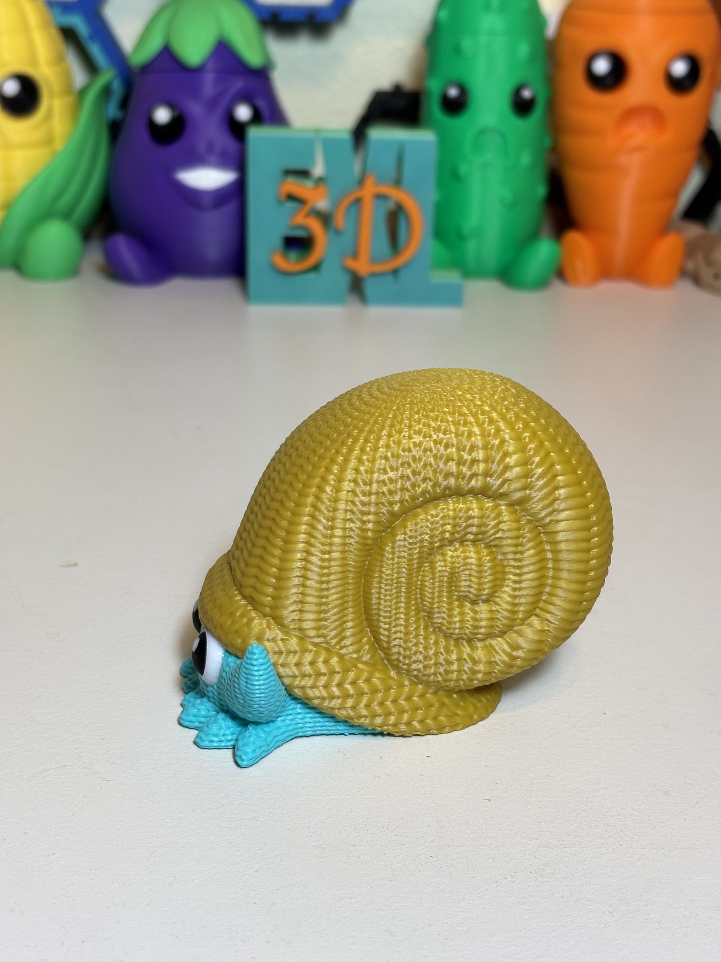 Side profile of 3D printed faux knit Omanyte collector figure