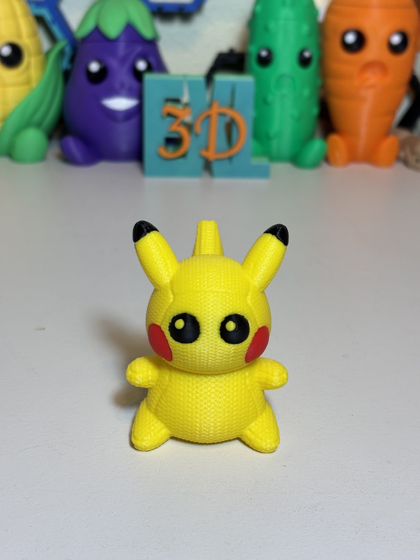 Close-up of faux knit surface detail on 3D printed Pikachu statue