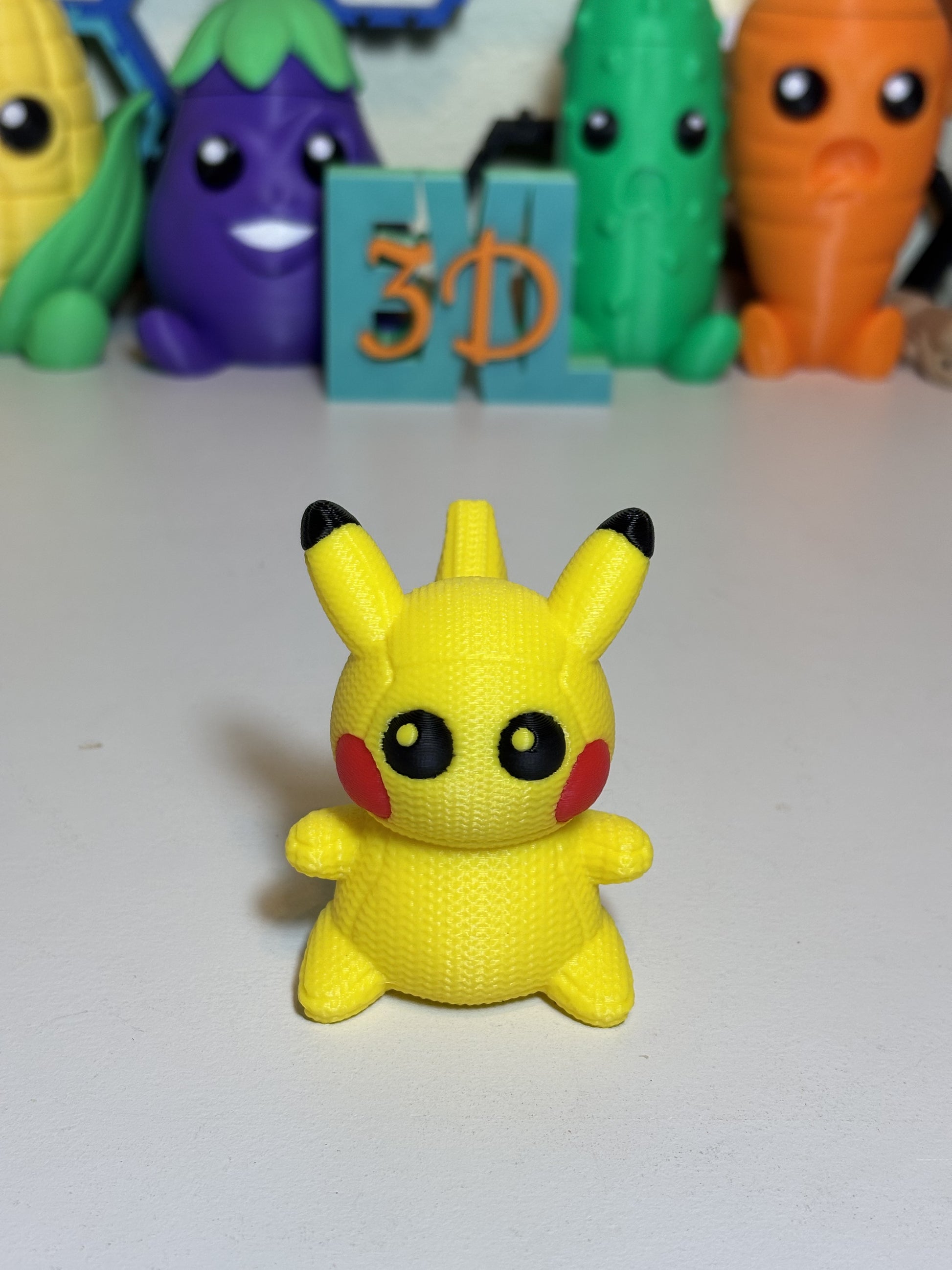 Close-up of faux knit surface detail on 3D printed Pikachu statue