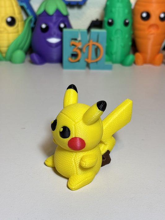 3D printed Pikachu figure with faux knit texture on wood desk