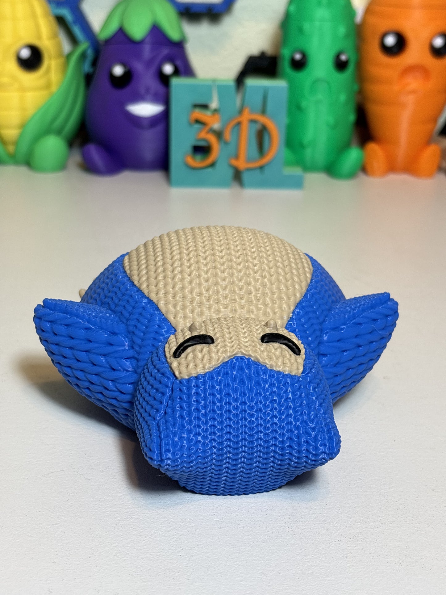 Faux knit Snorlax 3D printed figurine front view on neutral background
