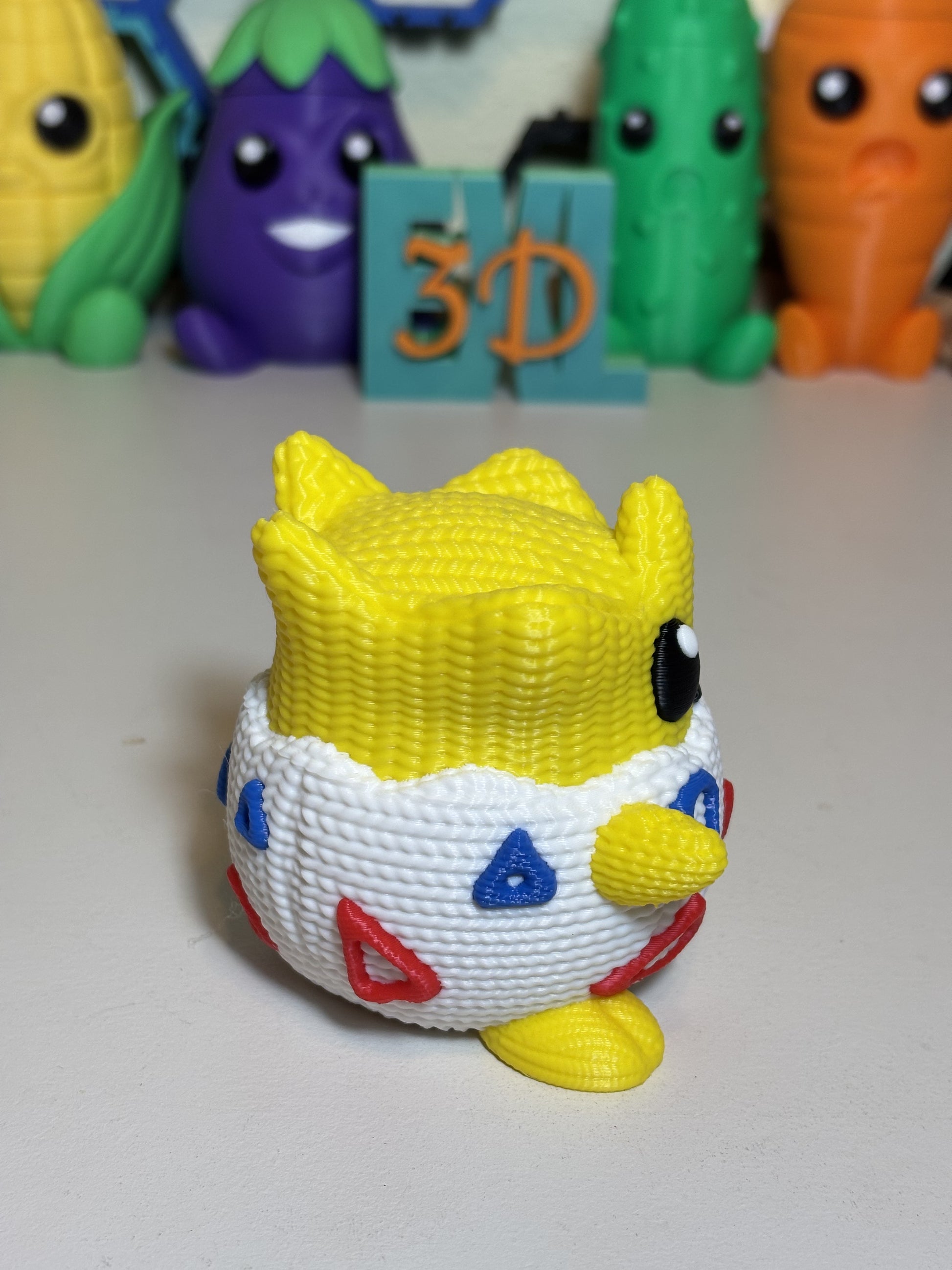 3D printed Togepi sculpture showing full figure from front angle